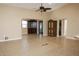 Spacious living room with tile floors and high ceilings at 6410 Tildon Ct, Leesburg, FL 34748