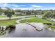 Private dock on a serene lake with lily pads at 10544 Via De Robina Ct, Clermont, FL 34711