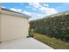 View of the backyard showing well-maintained landscaping and plenty of privacy at 1401 Valparaiso St, The Villages, FL 32162