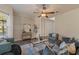 Well-lit living room features modern decor, stylish furniture, and an inviting atmosphere at 24126 Plymouth Hollow Cir, Sorrento, FL 32776