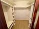 Walk-in closet featuring built in shelving and rod for hanging clothes at 1415 Harnden W Rd, Port Orange, FL 32129
