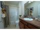 Clean bathroom with tub, shower, and vanity at 1750 Kingfisher Ct, The Villages, FL 32162