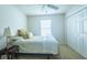 Bedroom with double bed, closet, and window at 1750 Kingfisher Ct, The Villages, FL 32162