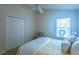 Bright bedroom with a double bed and built-in closet at 1750 Kingfisher Ct, The Villages, FL 32162