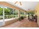 Spacious screened porch overlooking the backyard at 209 Shannon Ln, Lady Lake, FL 32159