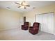 Large bedroom with neutral walls, plush carpet, and spacious closet at 4947 Ne 124Th Rd, Oxford, FL 34484