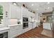 Well-equipped kitchen featuring double ovens and ample counter space at 8732 Providence Ct, Mount Dora, FL 32757