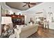 Open living room with hardwood floors and access to kitchen at 8732 Providence Ct, Mount Dora, FL 32757