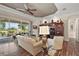 Living room with ample natural light and view of backyard at 8732 Providence Ct, Mount Dora, FL 32757