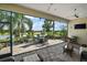 Large screened-in patio with lake view at 8732 Providence Ct, Mount Dora, FL 32757