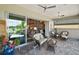 Spacious covered patio overlooking a lake at 8732 Providence Ct, Mount Dora, FL 32757