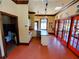 Community kitchen with restroom and red doors at 34416 Tuscany Ave, Sorrento, FL 32776