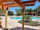 Pool area with pergola and lounge chairs at 34416 Tuscany Ave, Sorrento, FL 32776
