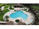 Aerial view of resort-style pool with cabanas at 34416 Tuscany Ave, Sorrento, FL 32776