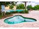 Community spa and pool area with surrounding landscaping at 34416 Tuscany Ave, Sorrento, FL 32776