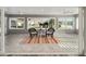 Relaxing sunroom with wicker chairs and a striped rug at 5701 Blanchard Ln, The Villages, FL 32163