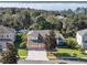 Beautiful home with a large yard and mature trees, located near a lake, offering serene surroundings at 13129 Coldwater Loop, Clermont, FL 34711