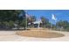 A community entrance with flags and a picnic shelter creates a welcoming ambiance at 2602 Tryon Pl, Windermere, FL 34786