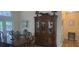 Bright dining room boasts wood floors, ample lighting, and backyard views, creating a warm atmosphere at 2602 Tryon Pl, Windermere, FL 34786