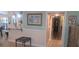Eat-in kitchen featuring a breakfast bar with pendant lights, ample counter space and tiled floors at 2602 Tryon Pl, Windermere, FL 34786