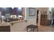 Modern kitchen features custom cabinets, granite countertops, stainless steel appliances, and tile backsplash at 2602 Tryon Pl, Windermere, FL 34786