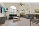 Spacious living room featuring high ceilings, fireplace, and tile flooring at 2602 Tryon Pl, Windermere, FL 34786