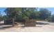 Community recreation center entrance sign surrounded by mature trees at 2602 Tryon Pl, Windermere, FL 34786