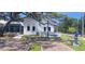 The town hall with a manicured lawn, a tribute and brick-paved walkway creates a great curb appeal at 2602 Tryon Pl, Windermere, FL 34786