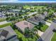 Aerial view showcasing a house's location in a golf course community at 2673 Beckett Run, The Villages, FL 32162