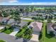 Aerial view of a house and surrounding golf course community at 2673 Beckett Run, The Villages, FL 32162