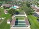 Aerial view of community bocce ball courts with covered seating areas at 2673 Beckett Run, The Villages, FL 32162