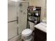 Bathroom with a shower and a toilet at 3726 Imperial Dr, Winter Haven, FL 33880