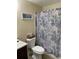 Clean bathroom with shower/tub and patterned curtain at 3726 Imperial Dr, Winter Haven, FL 33880