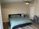 Spacious bedroom with ceiling fan and large bed at 3726 Imperial Dr, Winter Haven, FL 33880