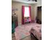 Charming bedroom with a unicorn theme and plenty of storage at 3726 Imperial Dr, Winter Haven, FL 33880