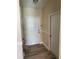 Bright entryway with laminate flooring and neutral walls at 3726 Imperial Dr, Winter Haven, FL 33880