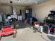 Garage with riding mower, tools and storage at 3726 Imperial Dr, Winter Haven, FL 33880