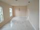 Open dining room with marble floors, soft paint, and a crystal chandelier at 18744 Sabal St, Orlando, FL 32833