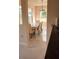 Bright dining room with marble floors and a glass table, perfect for gatherings at 18744 Sabal St, Orlando, FL 32833