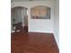 Spacious living room with dark hardwood flooring, providing a comfortable space at 18744 Sabal St, Orlando, FL 32833