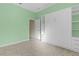 Light and bright bedroom with built-in murphy bed and storage at 25304 Forest Oak Ct, Leesburg, FL 34748