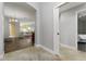 Bright entryway with tile flooring and views into living areas at 768 Bradford Loop, The Villages, FL 32163