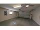 Clean and spacious two-car garage, providing ample room for parking and storage at 17755 Se 85Th Ellerbe Ave, The Villages, FL 32162