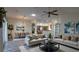Spacious living room flows to the kitchen and dining areas, perfect for gatherings at 17755 Se 85Th Ellerbe Ave, The Villages, FL 32162