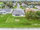 Aerial view showcasing home and neighborhood at 32857 Timberwood Dr, Leesburg, FL 34748