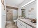 Clean bathroom with shower, toilet and vanity at 32857 Timberwood Dr, Leesburg, FL 34748