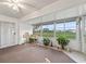 Bright sunroom with golf course view at 32857 Timberwood Dr, Leesburg, FL 34748