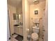 Clean bathroom with toilet, sink, and shower at 6116 Curry Ford Rd # 229, Orlando, FL 32822