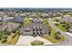 Residential neighborhood with lush landscaping and an inviting pool at 4049 Nostalgia Ter, The Villages, FL 32163