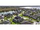 Residential neighborhood with lush landscaping and picturesque lake views at 4049 Nostalgia Ter, The Villages, FL 32163